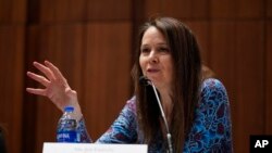 FILE - Jen Easterly, director of the U.S. Department of Homeland Security's Cybersecurity and Infrastructure Security Agency, speaks at a National Association of Secretaries of State meeting in Washington, Feb. 16, 2023.