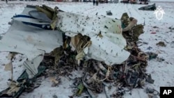 This image released Jan. 25, 2024, shows wreckage of an Ilyushin Il-76 near Yablonovo, Russia. Russia and Ukraine are trading accusations about the crash of the plane, which Moscow said Kyiv's forces shot down. (Russian Investigative Committee via AP)