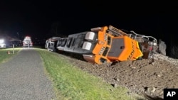 FILE - A derailed BNSF train is pictured on the Swinomish reservation near Anacortes, Wash., March 16, 2023. A judge on June 17, 2024, ordered BNSF Railway to pay nearly $400 million to the tribe for trespassing. (Washington Department of Ecology/AP)