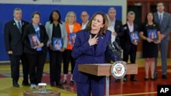 Vice President Kamala Harris speaks to the media after she met with families whose loved ones were murdered during the 2018 mass shooting at Marjory Stoneman Douglas High School in Parkland, Fla., March 23, 2024. 