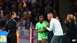 Referee Melissa Borjas shows a red card to England's Lauren James during the Women's World Cup round of 16 soccer match between England and Nigeria in Brisbane, Australia, Aug. 7, 2023.