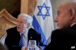 Republican presidential candidate Donald Trump meets with Israeli Prime Minister Benjamin Netanyahu at his Mar-a-Lago estate on July 26, 2024, in Palm Beach, Florida.