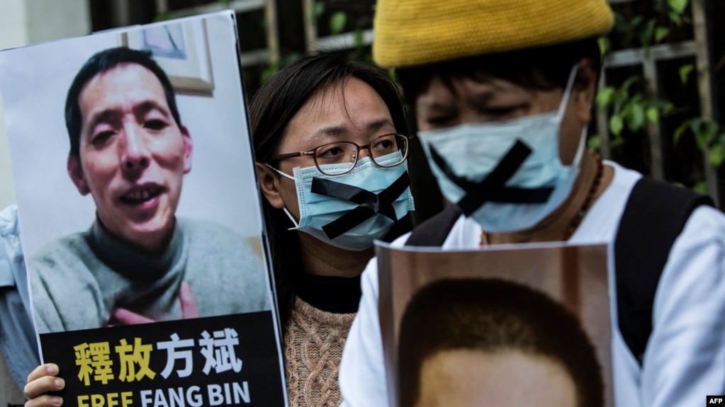 2020年2月19日，香港民主活动人士抗议北京当局逮捕中国著名反腐斗士许志永，以及关押通过自媒体揭露武汉新冠病毒大流行真相的公民记者方斌。(photo:VOA)