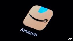 The Amazon app icon is seen on a smartphone, Feb. 28, 2023, in Marple Township, Pa. The European Union’s groundbreaking new digital rules governing what people encounter online took effect Aug. 25, 2023, for the biggest platforms.