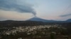 Volcano Rumbles Near Mexico City, Coating Towns with Ash, Disrupting Flights 