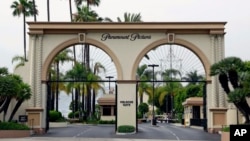 FILE - The main gate to Paramount Studios is seen on Melrose Avenue, in Los Angeles, July 8, 2015.
