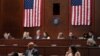 FILE - House Foreign Affairs Committee Chairman Michael McCaul poses a question to Ukraine's Prosecutor General Andriy Kostin during a hearing on alleged "Russian war crimes and other atrocities in Ukraine," on Capitol Hill in Washington, April 19, 2023.