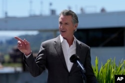 FILE - California Gov. Gavin Newsom speaks in Larkspur, Calif., April 16, 2024. California could soon deploy AI tools to help solve problems, under agreements announced May 9, 2024, as part of Newsom's efforts to harness technologies for public services.