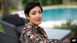 Rumman Chowdhury, co-founder of Humane Intelligence, sits for a photograph at her home Monday, May 8, 2023, in Katy, Texas. (AP Photo/David J. Phillip)