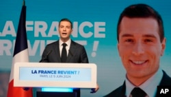 French far-right National Rally lead candidate Jordan Bardella delivers a speech at the party election night headquarters, in Paris, June 9, 2024.