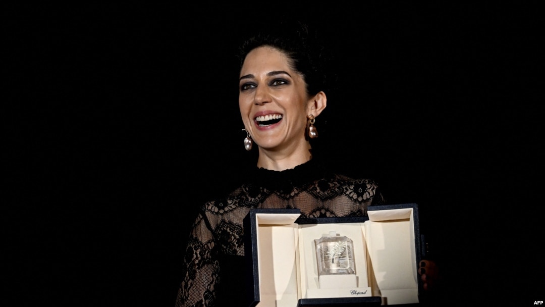 Iranian actress Zar Amir-Ebrahimi poses with her trophy after she won the Best Actress Prize for her part in "Holy Spider" during the closing ceremony of the 75th edition of the Cannes Film Festival in Cannes, France, May 28, 2022. 