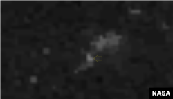 지난 9월 18일 라진항을 촬영한 야간 위성사진. 화살표가 가리키고 있는 지점이 무기 선적이 이뤄진 부두. 사진=NASA