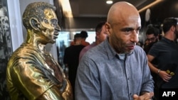 The son of late Brazilian football star Pele, Edson Cholbi Nascimento, visits the mausoleum where his father's coffin rests, at the Ecumenical Necropolis Memorial cemetery in Santos, Brazil on May 15, 2023.