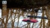 (FILE) A car is submerged in flood water after heavy rain from Storm Henk, Worcester, Britain.