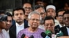 FILE - Nobel peace laureate Muhammad Yunus (C) speaks to the media after filing an appeal for the extension of his bail at the Labour Appellate Tribunal, in Dhaka on May 23, 2024. 