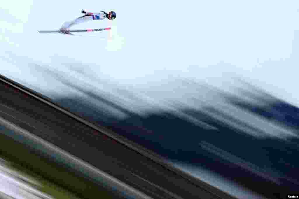 Poland's Maciej Kot is seen in action during ski jumping practice at Four Hills Tournament in Oberstdorf, Germany.