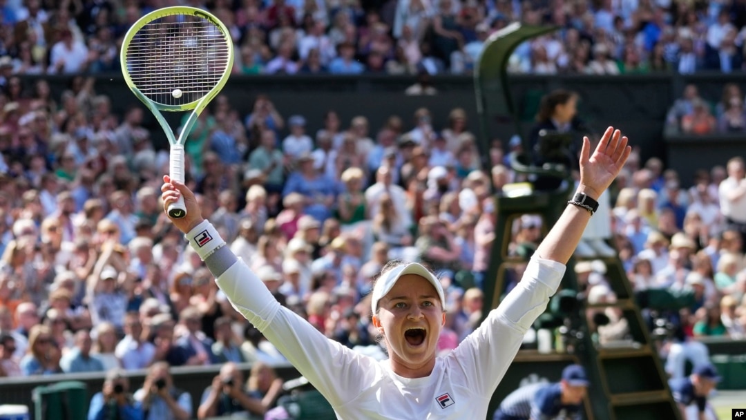 Barbora Krejcikova of the Czech Republic celebrates after defeating Jasmine Paolini of Italy in the women's singles final at the Wimbledon tennis championships in London, July 13, 2024. 