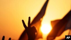 FILE - Peretas mengatakan menutup situs web bandara internasional Bahrain, Selasa, 14 Februari 2023, untuk menandai peringatan 12 tahun pemberontakan Musim Semi Arab di negara kecil Teluk itu. (AP/Hasan Jamali, File)