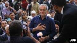 Iranian President-elect Masoud Pezeshkian visits the shrine of the Islamic Republic's founder, Ayatollah Ruhollah Khomeini, in Tehran on July 6, 2024.