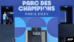 Gold, silver, and bronze medals are displayed on a custom-designed trunk by Louis Vuitton at the Champions Park at Trocadero during the Paris 2024 Olympic Games in Paris on Aug. 6, 2024.