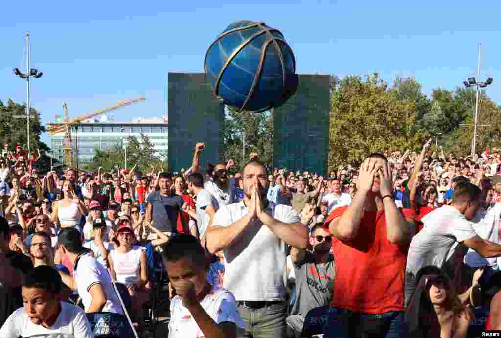 Serbia fans react as they watch the FIBA World Cup basketball final between Germany and Serbia in Belgrade, Serbia.