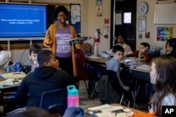 Ladawn Williams teaches fifth graders history at Whitehall Elementary School, Tuesday, Jan. 24, 2023, in Bowie, Md.