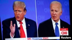 Detalj iz prenosa predsjedničke debate na televiziji CNN. (Foto: REUTERS/Emily Elconin)