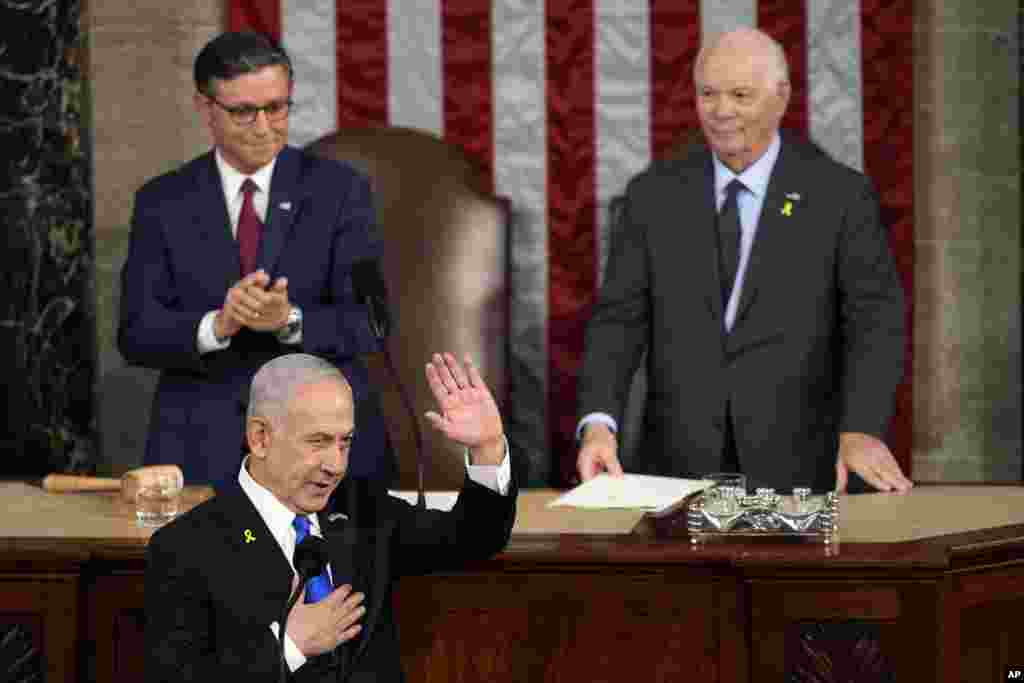 Israeli Prime Minister Benjamin Netanyahu speaks to a joint meeting of Congress at the Capitol in Washington, July 24, 2024, as House Speaker Mike Johnson of La., and Senate Foreign Relations Chair Ben Cardin, D-Md., watch. 