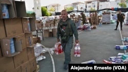 En fotos | Reservistas y voluntarios ponen manos a la obra en centro de ayuda en Israel