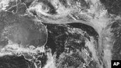 In this satellite image provided by the Japan Meteorological Agency, a potential cyclone is shown off the coast of Australia Jan 24. 2024. 