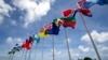 FILE - National flags for the Pacific Islands are on display on the tiny Pacific nation of Nauru, Sept. 3, 2018. 