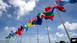 FILE - National flags for the Pacific Islands are on display on the tiny Pacific nation of Nauru, Sept. 3, 2018. 