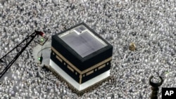 Muslim pilgrims circumambulate around the Kaaba, the cubic building at the Grand Mosque, during the annual Hajj pilgrimage in Mecca, Saudi Arabia, June 22, 2023.