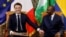 FILE: French President Emmanuel Macron (L) meets with Gabon's President Ali Bongo Ondimba (R) for a bilateral meeting at Presidential Palace in Libreville, on March 1, 2023. - French President Emmanuel Macron arrived in Libreville Wednesday for a four-day tour of Central Africa.