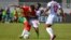 Abdessamad Ezzalzouli et Gedeon Kalulu avec Meschack Elia lors du match entre le Maroc et la RD Congo au Stade Laurent Pokou de San Pedro, le 21 janvier 2024.