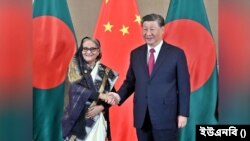ব্রিকস সম্মেলনে বাংলাদেশের প্রধানমন্ত্রী শেখ হাসিনা এবং চীনের প্রেসিডেন্ট শি জিনপিং।