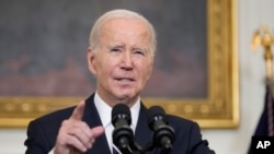 President Joe Biden speaks in the White House in Washington, Oct. 7, 2023, after the militant Hamas rulers of the Gaza Strip carried out an unprecedented, multi-front attack on Israel early that day.