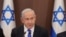 Israeli Prime Minister Benjamin Netanyahu attends the weekly cabinet meeting in the prime minister's office Jerusalem, Feb. 19, 2023. Netanyahu said that Iran was responsible for a reported attack on an oil tanker last week. 