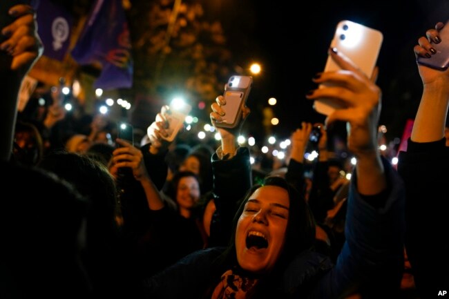 Women shout slogans as they gather to mark International Women's Day in Istanbul, Turkey, March 8, 2023.