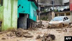 This handout picture released by Sao Sebastiao City Hall shows the damage caused by heavy rains in the municipality of Sao Sebastiao, north coast of the state of Sao Paulo, Brazil, on Feb. 19, 2023. (Photo by Sao Sebastiao City Hall / AFP)