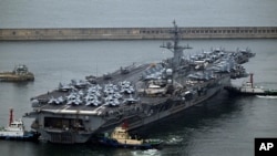 The USS Theodore Roosevelt (CVN 71) meli ya kivita ya Marekani imewasili Busan huko Korea Kusini. June 22, 2024. 