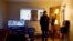 Rudolph Williams stands for a portrait in his apartment bedroom, Jan. 8, 2024, in Harvey, Ill. Williams was home in the Chicago south suburb when he realized that the doors and windows to his courtyard-style apartment had been boarded up.