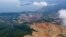 FILE - An aerial view of the Fenix Mine, run by the Swiss-based Solway Investment Group, in El Estor, Guatemala, Oct. 26, 2021.