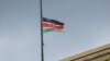 A Kenyan national flag flies at half mast in Nairobi on April 19, 2024, in honor of its defense chief General Francis Omondi Ogolla and nine other senior military officers who were killed in a helicopter crash.