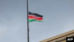 A Kenyan national flag flies at half mast in Nairobi on April 19, 2024, in honor of its defense chief General Francis Omondi Ogolla and nine other senior military officers who were killed in a helicopter crash.