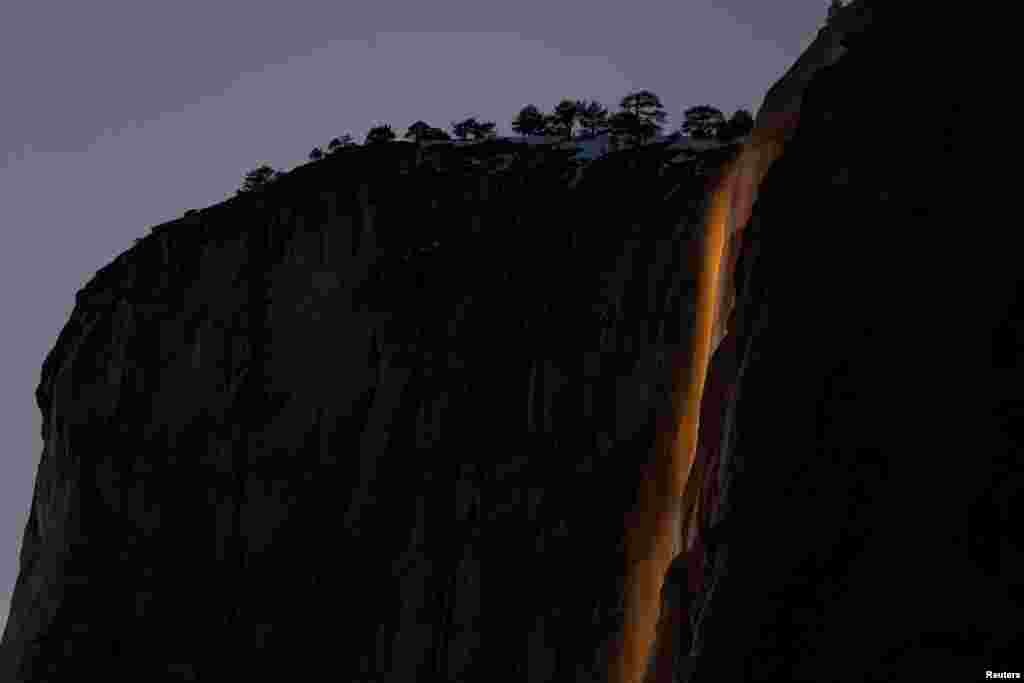 Horsetail Fall at El Capitan is seen during sunset in Yosemite National Park, California, Feb. 15, 2023.&nbsp;The phenomenon of this vista only occurs for a few days in February each year when several weather and climatic conditions are just right.&nbsp;