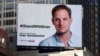 FILE - A billboard calling for release of Wall Street Journal reporter Evan Gershkovich is seen on the one-year anniversary of his imprisonment in Russia, in New York's Times Square, March. 29, 2024. 