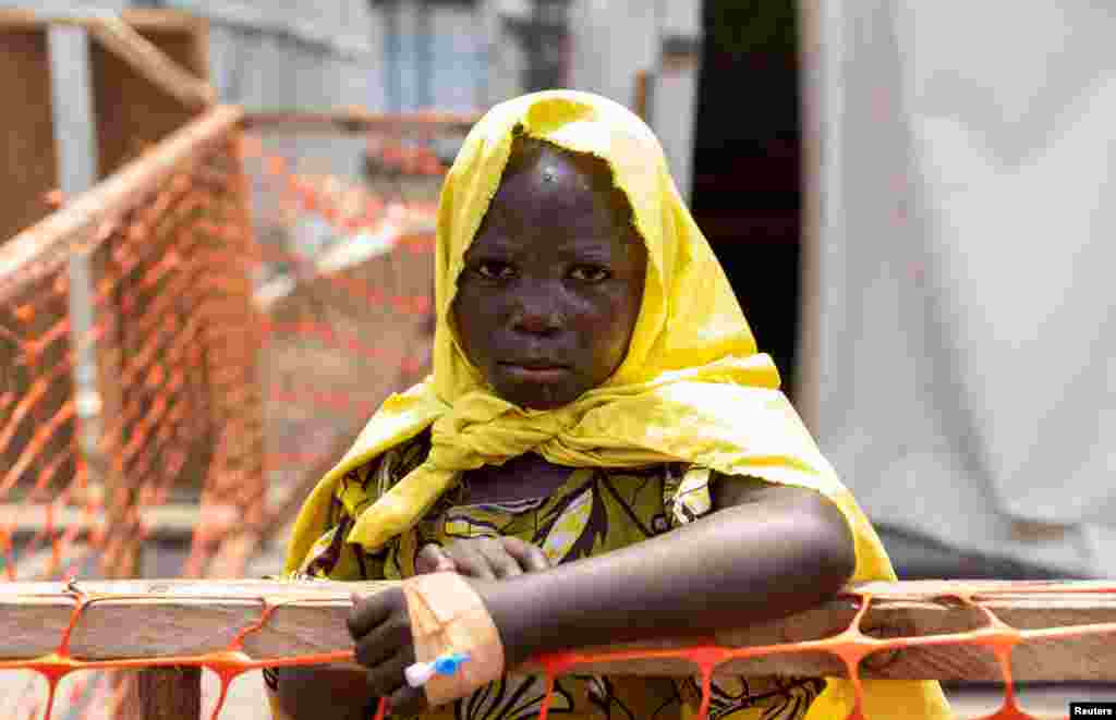 A newly arrived patient awaits consultation at the treatment center for Mpox, an infectious disease caused by the monkeypox virus, in Munigi, near Goma in North Kivu province of the Democratic Republic of Congo, Aug. 19, 2024.