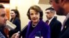 FILE — U.S. Senator Dianne Feinstein talks to reporters as she walks to the Senate floor on Capitol Hill in Washington, Dec. 9, 2014. Feinstein died Thursday at age 90.