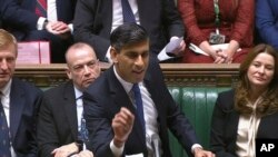 In this photo issued by UK Parliament, Britain's Prime Minister Rishi Sunak speaks during Prime Minister's Questions in the House of Commons, London, Jan. 17, 2024. 